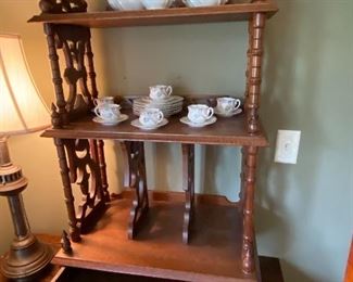Ca. 1875 solid walnut book/manuscript/folio stand with fretwork dividers in lower section.  Dovetailed drawer in base.  Will stand on the floor.