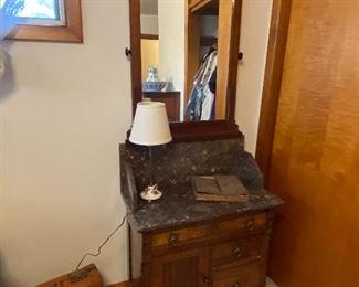 Marble-topped antique walnut chest with beautiful mirror