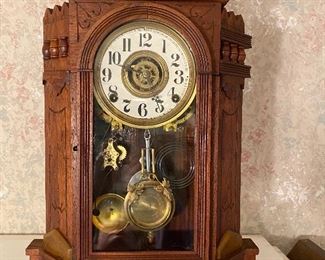 Victorian walnut clock, Ca. 1885 by Gilbert clock co, 8 day time and strike movement