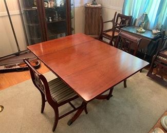 Duncan Phyfe style drop leaf table, perfect for a small or large home with 6 chairs