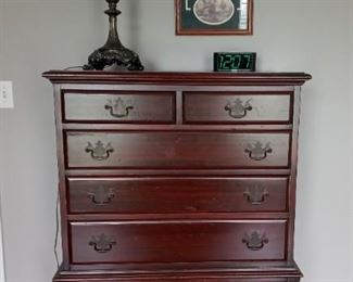 Chest of drawers and lamp