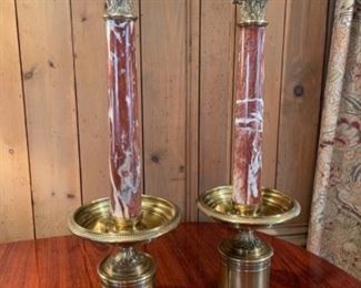 Brass and Marble Candlesticks .  Stunning pair of 25” tall brass and marble candlesticks.   Exquisite red marbling with elegant long lines of white and black veins.   Both brass and marble are in excellent condition.  25”H x 8”W x 8” D.  