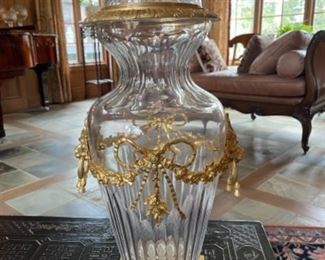 French Crystal Vases Covered with Gold Detail. The gold detail of Lion mask handles and bow decorated mounts is exquisite.   
29”H x 9”W x 9”D