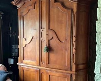 Giant Cusrom Cherry Armoire.  Dale Medderick and was a prototype for a smaller scale. This is a one of a kind piece. 112” x 76” W x 26”D