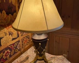 Claw Foot Lamp with Brass Accents.  Off white Lamp shade is made of leather. 22” H