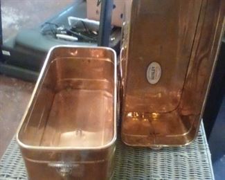 2 solid brass containers