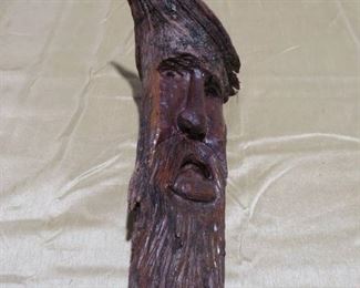 Hand Carved Man in a Tree