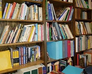 Walls of books. Cabinets of Books. Bookcases of Books.  Hardbacks, Coffee Table, Paperbacks, etc. 