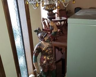This is 'Liberace' piece for sure...Warrior with Chandelier  that lights up! 
