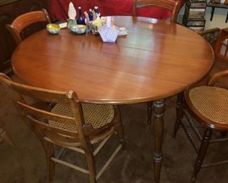 Round Table with Leaf and four Chairs
