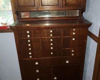 Antique Dental Cabinet - Marble on the Bottom - Compartments are for dental tools. Early 1900's. Came out of local Dentist office. Currently was used for Jewelry Cabinet. It's a wow! 