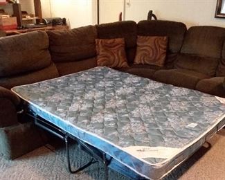 Lazy Boy sectional couch with 2 recliners, cup holder tray and pull out bed