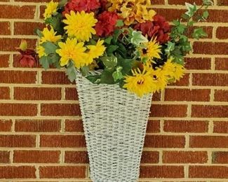 Wicker basket with silk flowers