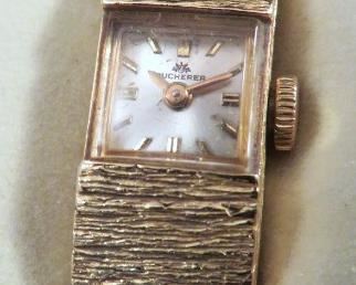 STRIKING VINTAGE BUCHERER 18K GOLD LADIES BRACELET WATCH