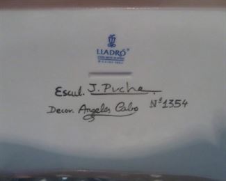 SIGNATURE ON "GARDEN OF DREAMS" FIGURE - DESIGNER JOSE PUCHE AND DECORATOR ANGELES CABO. THIS PIECE IS A LIMITED EDITION (#1354 OF 4000) AND WAS RETIRED IN 1996.