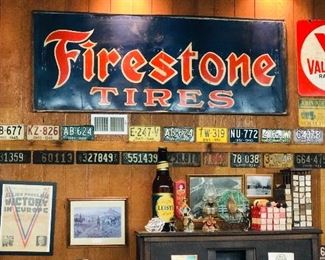 Appears to be hand painted tin Firestone Tires advertising sign      
37.5" x 8' 