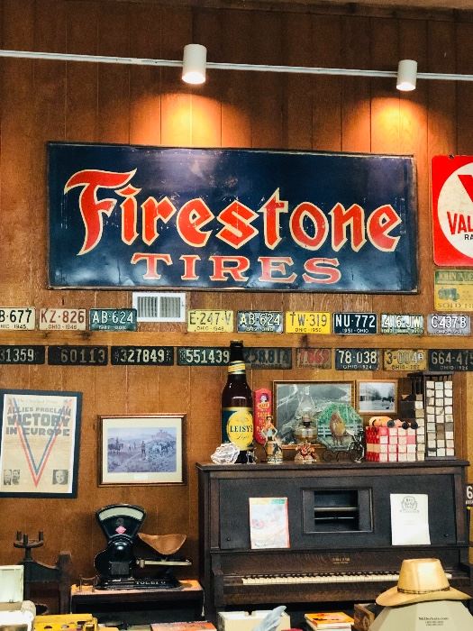 Appears to be hand painted tin Firestone Tires advertising sign      
37.5" x 8' 