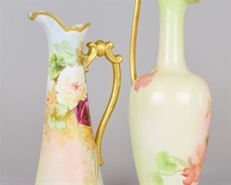 17 2 Hand Painted Porcelain Ewers Both with floral motifs and gilt painted rims and handles. B&H Limoges France (Blakeman & Henderson), 11 1/4"H; Rosenthal Bavaria, artist signed illegibly on underside, 14"H