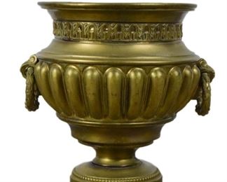 25 Brass Planter With acanthus leaf handles. 18"H x 15"-diameter at top. Some wear, minor losses to brass.