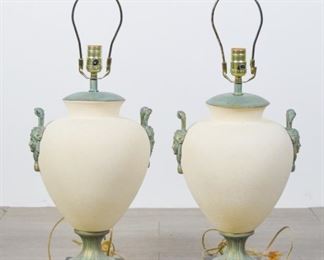 29 Pair of Ceramic Lamps With brass fittings and figural handles, all with green patina. Each 27 1/2"H.