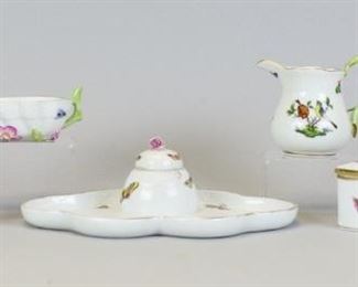43 Herend Rothschild Bird Porcelain Grouping 5 pieces of Herend hand painted porcelain in the Rothschild Bird pattern. Inkwell, 8 1/4"L; covered rectangular box, 5"L x 3 1/4"W x 2"H; creamer, 2 3/4"H; leaf shaped sugar bowl, 4"L; miniature tureen, with lid with bird finial, 5"L x 3 3/4"H. Box and sugar bowl with contemporary Herend Hungary Handpainted marks, miniature tureen and creamer with c. 1930s mark, inkwell with early 20th century mark and incised Herend.