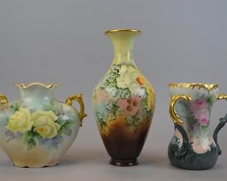 59 Limoges Porcelain Loving Cup & Vases T&V Limoges (Tressemanes & Vogt) loving cup, artist initialed on the underside and dated 1899, 6 3/4"H; JPL (Jean Pouyat Limoges) 2 handled vase, impressed 544 on the underside7"H; WG & Co. Limoges (William Guerin & Co.) vase, 11 1/4"H. Losses to gilt on loving cup and 2 handled vase.