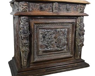 73 18th Century Continental Carved Figural Cabinet Carved Continental cabinet. Good condition. Top has a few scratches and scuffs. Bottom base molding has a few cracks located all around it. Left atlas support has some flaws. 42.5" L x 25.25" W x 37" H Two drawers with one door, which is missing a pin and is held closed by a single screw. No identifying marks.