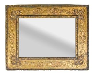 78 Gilded Palladio Mirror A gilded mirror manufactured by Palladio, Italy. Back of mirror is stamped and stickered with Palladio logo. Very good condition with minimal scratches on top edge of frame. 29" L x 23.25" H