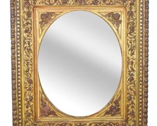 83 Neoclassical Gilt Cheribum Mirror A mirror set in a rectangular gilded frame adorned with cherubs, aviary, and vegetative motifs along its border. Mirror backing is slightly loose on the top, and bottom right acanthus corner is missing. Good condition. The back of the mirror is missing a felt pad on its bottom left. No maker's marks identified. 48" Tall X 41" W