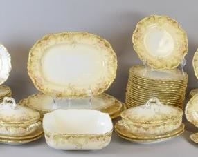 93 88 Piece Cauldon Porcelain Dinnerware Set 88 piece set of Cauldon England for Phillips London porcelain dinnerware: 1 lidded tureen, 4 lidded vegetables with underplates, 1 small lidded vegetable with underplate, 1 additional underplate for a small vegetable, 1 square serving bowl, 1 large platter, 1 medium platter, 2 smaller platters, 35 dinner plates, 24 salad plates, 12 bowls. All stamped Cauldon England and Phillips London To the Queen with crown mark and marked in red H7242. Dinner plates each 9 3/4"-diameter, largest platter 18 1/4"L, tureen 11"L x 7 1/2"H