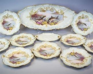101 10 Piece Limoges Porcelain Fish Set Hand painted L.S. & S. (Lewis Strauss & Son) Limoges porcelain fish set, consisting of a platter and 9 plates. All marked with L.S. & S. Limoges France and Limoges star marks. Platter 24"L, plates 9 1/4"-diameter