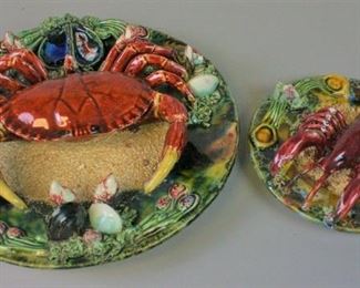 140 2 Palissy Ware Majolica Chargers Crab and shell motif charger, illegible impressed mark on the underside, 12"-diameter; lobster & shell motif, 7 1/2"-diameter. Minor chips to decoration along rim of crab charger.