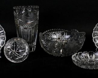 177 6 Piece Glass Grouping Cut crystal vase, 8 1/2"H; cut glass bowl, 3 3/4"H x 7 3/4"-diameter, 3 small cut glass plates, each 5 3/4"-diameter; round cut glass vase, 4 1/4"H. Chip on bottom edge of crystal vase, rim chips on plates.