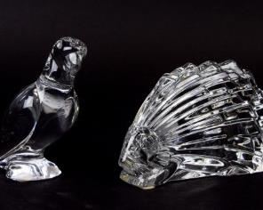 180 Baccarat & Steuben Crystal Animals 4 crystal animals. Pair of Baccarat parrots, each 4"H; Baccarat porcupine, 5"L x 3 1/4"H; Steuben hare hand cooler, 2 1/2"H. Parrots and porcupine with etched Baccarat France marks, porcupine and 1 parrot also with paper Baccarat labels, hare signed Steuben.