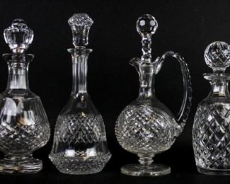 182 4 Waterford & Galway Crystal Decanters Waterford Colleen pattern brandy decanter, 12 1/2"H including stopper; Waterford Alana pattern decanter, 10 1/2"H including stopper; Waterford Prestige claret decanter, 12 1/2"H including stopper; Galway decanter, 13"H including stopper. Galway with paper labels, Waterford decanters all with etched Waterford marks. Stopper replaced on claret decanter.