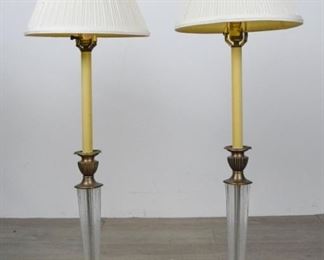 187 Pair of Chapman Brass & Glass Lamps Pair of crystal and brass candlestick form lamps. With Chapman paper labels. Each 39"H including finials.