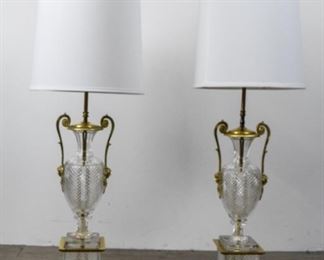 188 Pair of French Cut Crystal & Brass Lamps Pair of cut crystal lamps with brass mounts and figural maiden handles. Paper Made in France labels to the undersides. Each 41"H including finials.