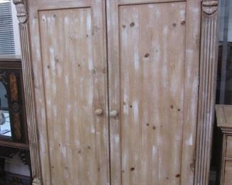 Country Casuals Pine Armoire by Ficks Reed.  Bun Feet, Carved Details & Curved Cornice                             