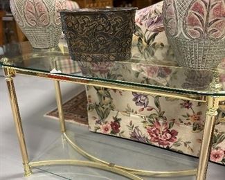 Glass top brass console table