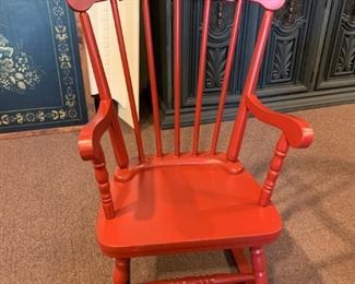 Red child's rocker rocking chair