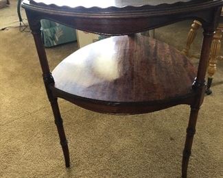 Antique pear shape mahogany two tier end table