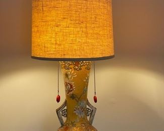 Yellow chinoiserie 2-way table lamp. Measures 52"H. Photo 1 of 2
