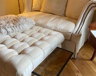 Plunket oversized chair with nailhead trim and tufted ottoman. Chair measures 61"W x 40"D. Ottoman has two pull-out cocktail trays. It measures 43"W x 31"D. Photo 1 of 2