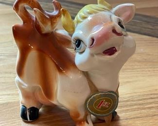 Vintage Tilso cow figurine with first place ribbon. Circa 1950s. Photo 1 of 2.