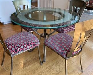 42" round glass top kitchen table and four chairs. Photo 1 of 2