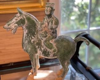 Stone horse and rider figurine