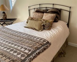 Full-size metal bed frame and mattress. Two available. Photo 1 of 2