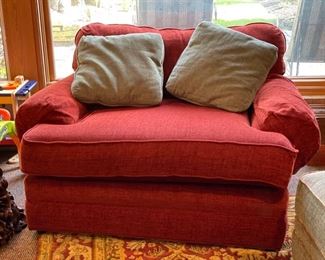 Smith Craft oversized chair upholstered in red chenille fabric. Measures 53"W. Seat depth is 33"