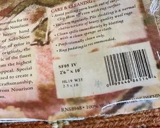 Wool runner measures 10' x 2'6". Photo 3 of 3