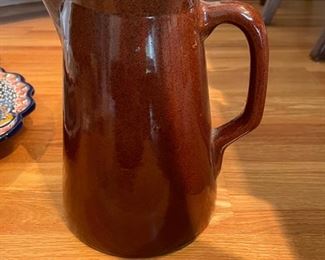 Brown ceramic pitcher